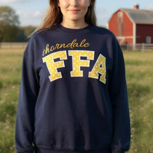 Person wearing Thorndale FFA sweatshirt in field